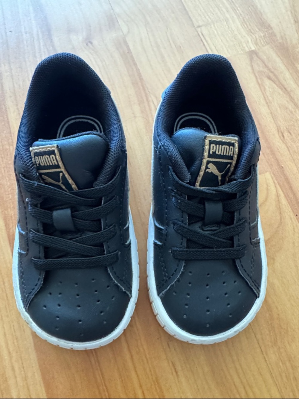 Puma Kids Black Sneakers with White Sole and Gold Logo